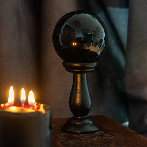 Black Crystal Ball On Stand